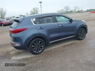 2018 Kia Sportage EX z VIN KNDPN3AC0J7477840, wystawiony jako IAAI lot #42162283 z przebiegiem 164 891 mil mil oraz . Historia ofert i sprzedaży dostępna na DreamBid. Obrazek 4.