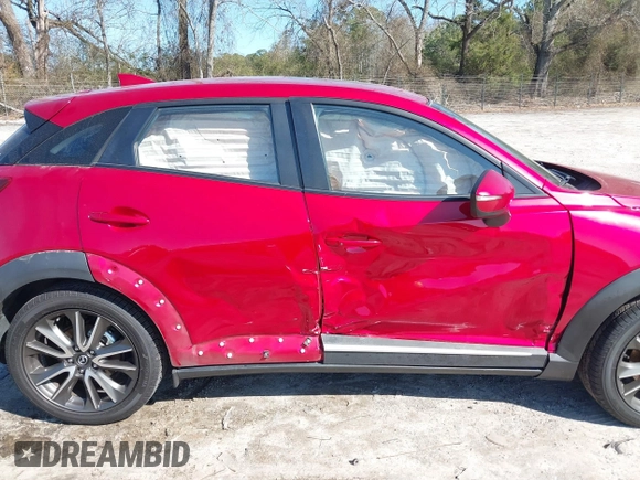2016 Mazda CX-3 Grand Touring with VIN JM1DKFD72G0129096, listed as a IAAI auction lot 41592893 with 144,860 mi miles. Bid and sale history available at carsss.com. Image 6.