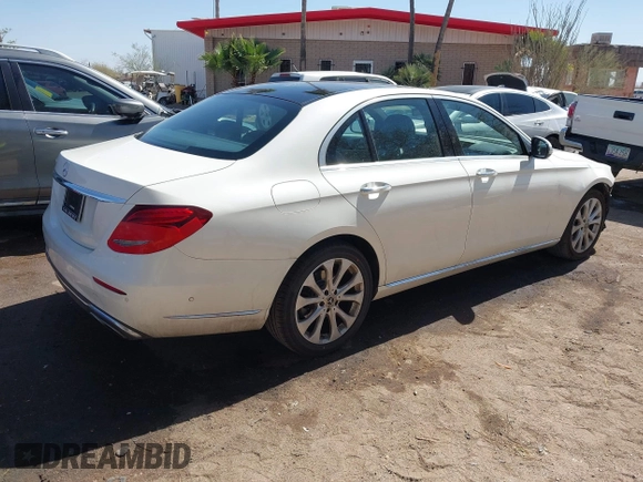 2019 Mercedes-Benz E-Class E 300 with VIN WDDZF4JBXKA597397, listed as a IAAI auction lot 41724672 with 99,258 mi miles. Bid and sale history available at carsss.com. Image 4.