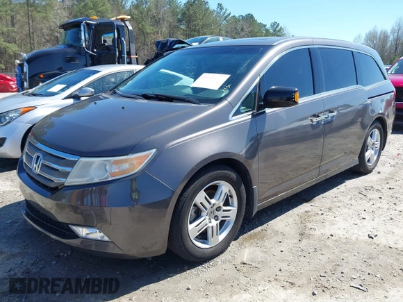 2012 Honda Odyssey Touring with VIN 5FNRL5H91CB057344, listed as a IAAI auction lot 41835272 with 158,854 mi miles. Bid and sale history available at carsss.com. Image 18.