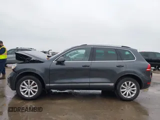 2012 Volkswagen Touareg Sport with VIN WVGEF9BP9CD008545, listed as a IAAI auction lot 41492653 with 138,424 mi miles and . Bid and sale history available at DreamBid. Image 15.