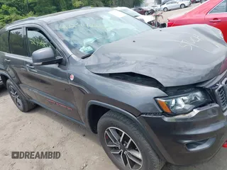 2021 Jeep Grand Cherokee Trailhawk with VIN 1C4RJFLG1MC707189, listed as a IAAI auction lot 42440252 with 40,169 mi miles and . Bid and sale history available at DreamBid. Image 1.