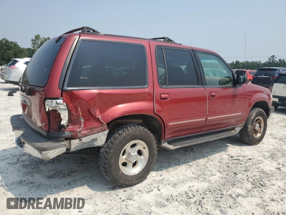 2000 Ford Explorer XLT with VIN 1FMZU73E4YZA72348, listed as a Copart auction lot 59015585 with 182,606 mi miles and Salvage title. Bid and sale history available at DreamBid. Image 3.