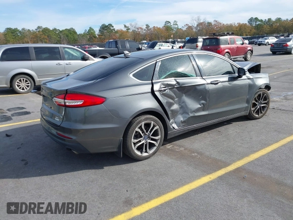 2019 Ford Fusion SEL with VIN 3FA6P0CD9KR252892, listed as a IAAI auction lot 41087776 with 109,498 mi miles and . Bid and sale history available at DreamBid. Image 4.
