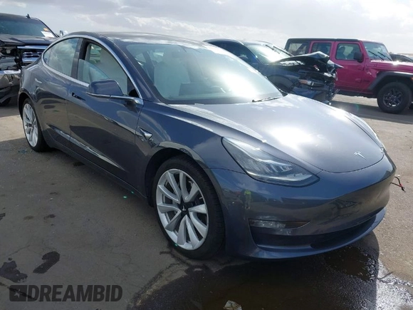 2018 Tesla Model 3 Long Range Battery with VIN 5YJ3E1EA5JF169097, listed as a IAAI auction lot 41916873 with 81,919 mi miles. Bid and sale history available at carsss.com. Image 1.