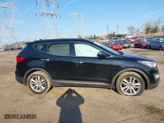 2014 Hyundai Santa Fe Sport with VIN 5XYZWDLA4EG137283, listed as a IAAI auction lot 41902510 with 142,467 mi miles. Bid and sale history available at carsss.com. Image 14.