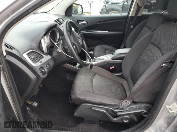 2017 Dodge Journey SE z VIN 3C4PDCAB2HT601316, wystawiony jako Copart lot #54153395 z przebiegiem 138 737 mil mil oraz Szkoda całkowita • Salvage title. Historia ofert i sprzedaży dostępna na DreamBid. Obrazek 7.