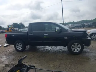 2004 Nissan Titan LE z VIN 1N6AA07A14N592255, wystawiony jako IAAI lot #42264477 z przebiegiem 191 259 mil mil oraz . Historia ofert i sprzedaży dostępna na DreamBid. Obrazek 14.