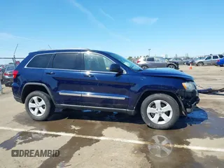 2012 Jeep Grand Cherokee Laredo with VIN 1C4RJFAG0CC160255, listed as a IAAI auction lot 41967809 with 127,702 mi miles. Bid and sale history available at carsss.com. Image 14.