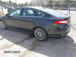 2015 Ford Fusion Titanium with VIN 3FA6P0K99FR268450, listed as a IAAI auction lot 41805513 with 202,009 mi miles. Bid and sale history available at carsss.com. Image 3.