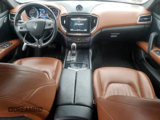2017 Maserati Ghibli S Q4 z VIN ZAM57RTA4H1248389, wystawiony jako Copart lot #85218514 z przebiegiem 68 272 mil mil oraz Szkody całkowita. Historia ofert i sprzedaży dostępna na DreamBid. Obrazek 8.