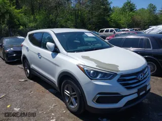 2018 Hyundai Santa Fe Sport 2.4L with VIN 5NMZT3LB7JH091203, listed as a IAAI auction lot 41983942 with 124,285 mi miles. Bid and sale history available at carsss.com. Image 6.