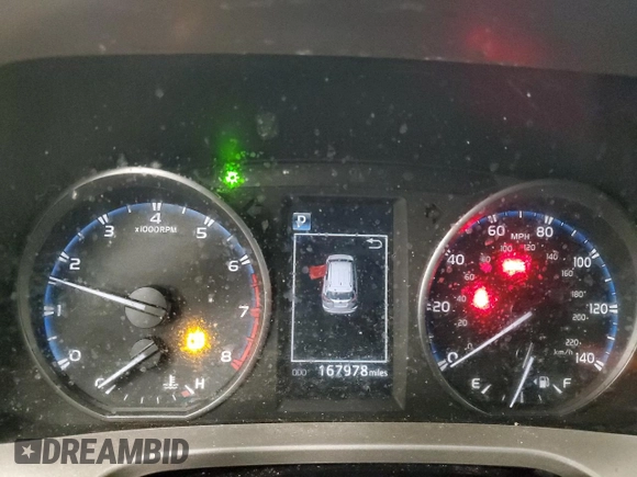 2018 Toyota RAV4 LE with VIN JTMBFREV9JJ197097, listed as a Copart auction lot 50042325 with 167,978 mi miles and Salvage Title. Bid and sale history available at DreamBid. Image 9.