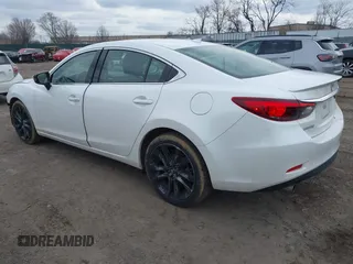 2016 Mazda 6 i Grand Touring with VIN JM1GJ1W54G1485851, listed as a IAAI auction lot 41629410 with 91,327 mi miles. Bid and sale history available at carsss.com. Image 3.