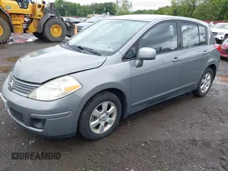 2009 Nissan Versa S with VIN 3N1BC13E19L473132, listed as a IAAI auction lot 42349859 with 122,272 mi miles and . Bid and sale history available at DreamBid. Image 2.