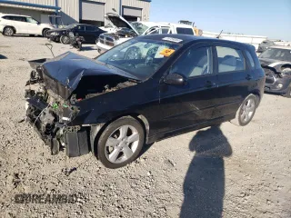 2007 Kia Spectra with VIN KNAFE162375006203, listed as a Copart auction lot 76739084 with 0 mi miles and Salvage Title. Bid and sale history available at carsss.com. Image 1.