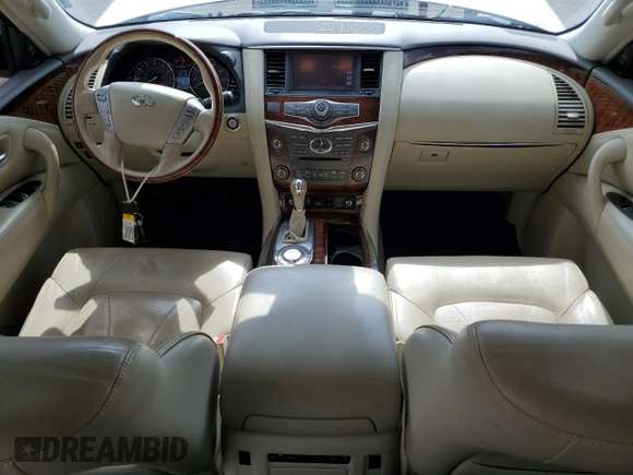 2015 Infiniti QX80 z VIN JN8AZ2NF0F9574531, wystawiony jako Copart lot #56172755 z przebiegiem 190 249 mil mil oraz Czysty tytuł • Clean title. Historia ofert i sprzedaży dostępna na DreamBid. Obrazek 8.
