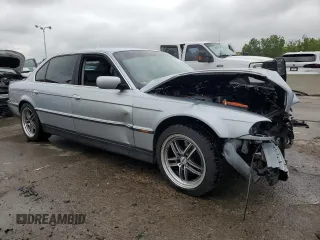 1997 BMW 7 Series 740il with VIN WBAGJ8323VDM00753, listed as a Copart auction lot 66674414 with 255,389 mi miles and Salvage Title. Bid and sale history available at carsss.com. Image 4.