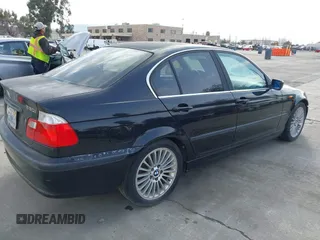 2003 BMW 3 Series 330i with VIN WBAEV534X3KM29039, listed as a IAAI auction lot 41850238 with 127,791 mi miles. Bid and sale history available at carsss.com. Image 4.