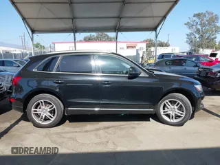 2015 Audi Q5 Premium Plus z VIN WA1LFAFP0FA013351, wystawiony jako IAAI lot #42537653 z przebiegiem 98 842 mil mil oraz . Historia ofert i sprzedaży dostępna na DreamBid. Obrazek 13.