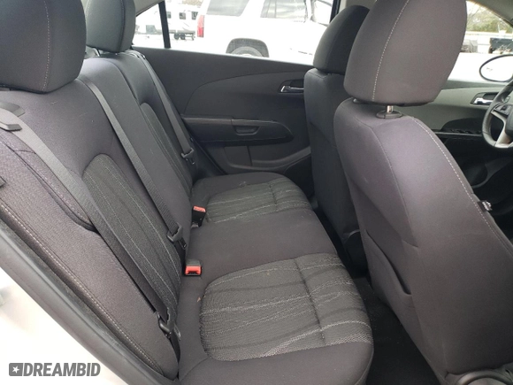 2014 Chevrolet Sonic LT with VIN 1G1JC5SHXE4143722, listed as a Copart auction lot 50823675 with 77,985 mi miles and Salvage Title. Bid and sale history available at carsss.com. Image 10.