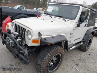2006 Jeep Wrangler X with VIN 1J4FA39S16P703436, listed as a IAAI auction lot 41341557 with 65,639 mi miles. Bid and sale history available at carsss.com. Image 17.