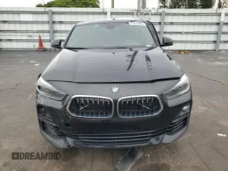 2018 BMW X2 sDrive28i with VIN WBXYJ3C34JEJ91176, listed as a Copart auction lot 63418365 with 62,586 mi miles and Salvage title. Bid and sale history available at DreamBid. Image 5.