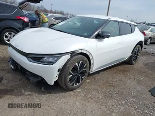2022 Kia EV6 Wind with VIN KNDC3DLC5N5039405, listed as a IAAI auction lot 41937250 with 55,659 mi miles and . Bid and sale history available at DreamBid. Image 2.