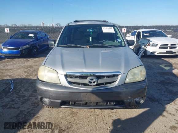 2003 Mazda Tribute LX with VIN 4F2YZ04183KM44733, listed as a IAAI auction lot 41472662 with 246,522 mi miles and . Bid and sale history available at DreamBid. Image 12.