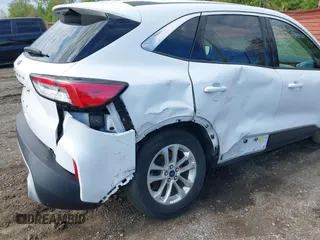 2021 Ford Escape SE z VIN 1FMCU0G60MUB22668, wystawiony jako IAAI lot #42213083 z przebiegiem 25 159 mil mil oraz . Historia ofert i sprzedaży dostępna na DreamBid. Obrazek 6.