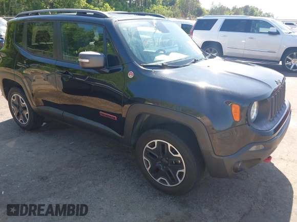 2015 Jeep Renegade Trailhawk with VIN ZACCJBCT1FPC17815, listed as a IAAI auction lot 42043290 with 247,652 mi miles and . Bid and sale history available at DreamBid. Image 1.