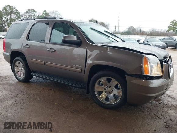 2014 GMC Yukon SLT with VIN 1GKS1CE00ER164663, listed as a IAAI auction lot 41547771 with 178,998 mi miles. Bid and sale history available at carsss.com. Image 1.