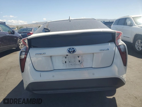 2018 Toyota Prius Two z VIN JTDKBRFU4J3082395, wystawiony jako Copart lot #56761505 z przebiegiem Nie podano mil oraz Szkoda całkowita • Salvage title. Historia ofert i sprzedaży dostępna na DreamBid. Obrazek 6.