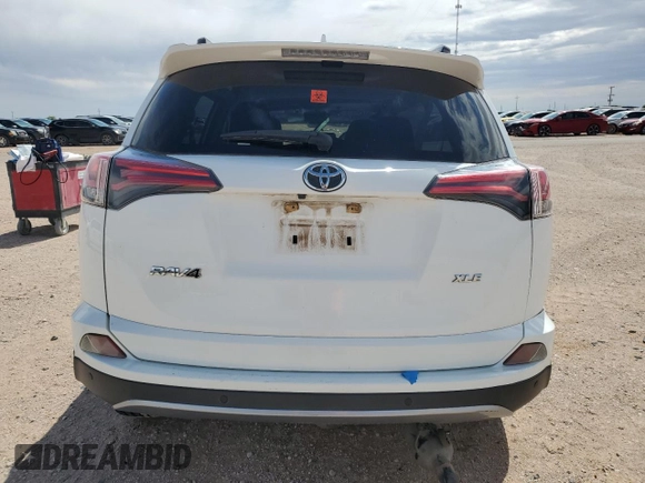 2018 Toyota RAV4 XLE with VIN JTMWFREV9JJ187834, listed as a Copart auction lot 56125505 with Not provided miles and Salvage title. Bid and sale history available at DreamBid. Image 6.