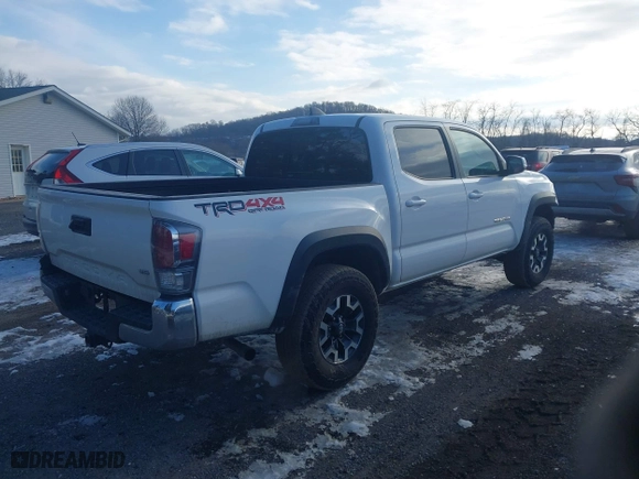 2023 Toyota Tacoma 4WD SR with VIN 3TMCZ5ANXPM599135, listed as a IAAI auction lot 41442577 with 26,901 mi miles. Bid and sale history available at carsss.com. Image 4.