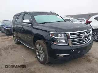 2016 Chevrolet Tahoe LTZ with VIN 1GNSCCKC2GR100879, listed as a IAAI auction lot 41112832 with 213,649 mi miles and . Bid and sale history available at DreamBid. Image 1.