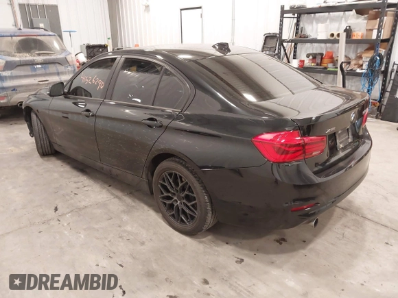 2018 BMW 3 Series 320i xDrive with VIN WBA8E5G5XJNU46855, listed as a IAAI auction lot 41526290 with 68,720 mi miles. Bid and sale history available at carsss.com. Image 3.
