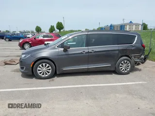 2017 Chrysler Pacifica Touring L with VIN 2C4RC1BG1HR540246, listed as a IAAI auction lot 42107768 with 151,268 mi miles and . Bid and sale history available at DreamBid. Image 14.