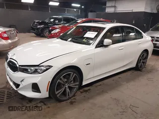 2023 BMW 3 Series 330e xDrive with VIN 3MW39FS05P8D20575, listed as a IAAI auction lot 42076033 with 10,875 mi miles. Bid and sale history available at carsss.com. Image 17.