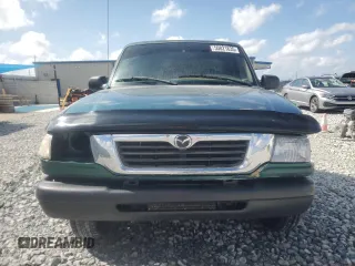 1999 Mazda B-Series Truck SX z VIN 4F4YR12CXXTM34917, wystawiony jako Copart lot #50821635 z przebiegiem 121 165 mil mil oraz Szkoda całkowita • Salvage title. Historia ofert i sprzedaży dostępna na DreamBid. Obrazek 5.