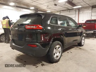 2016 Jeep Cherokee Sport with VIN 1C4PJMAB0GW321370, listed as a IAAI auction lot 41487094 with 131,336 mi miles and . Bid and sale history available at DreamBid. Image 4.