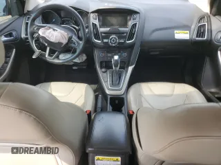 2018 Ford Focus Titanium z VIN 1FADP3N20JL271719, wystawiony jako Copart lot #60784755 z przebiegiem 116 118 mil mil oraz Szkoda całkowita • Salvage title. Historia ofert i sprzedaży dostępna na DreamBid. Obrazek 8.