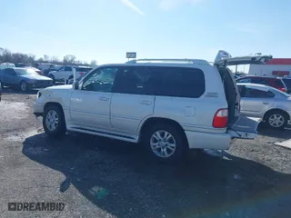 2005 Lexus LX 470 with VIN JTJHT00W653551986, listed as a IAAI auction lot 41575221 with 166,287 mi miles. Bid and sale history available at carsss.com. Image 3.