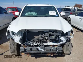 2023 Toyota Tacoma 4WD SR with VIN 3TMCZ5AN7PM653250, listed as a IAAI auction lot 41673534 with 19,496 mi miles. Bid and sale history available at carsss.com. Image 13.