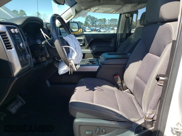 2016 Chevrolet Silverado 1500 LT with VIN 1GCVKREC5GZ396407, listed as a Copart auction lot 50081455 with 126,964 mi miles and Salvage Title. Bid and sale history available at DreamBid. Image 7.
