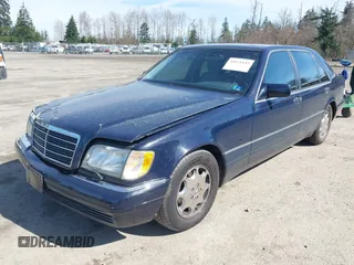 1995 Mercedes-Benz S with VIN WDBGA43E6SA228817, listed as a IAAI auction lot 41871143 with 104,274 mi miles and . Bid and sale history available at DreamBid. Image 2.