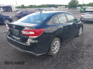 2019 Subaru Impreza with VIN 4S3GKAB67K3620703, listed as a IAAI auction lot 42284703 with 79,474 mi miles and . Bid and sale history available at DreamBid. Image 4.