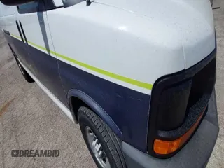 2016 Chevrolet Express Cargo Van with VIN 1GCWGBFF5G1206545, listed as a IAAI auction lot 41960565 with 273,796 mi miles. Bid and sale history available at carsss.com. Image 1.