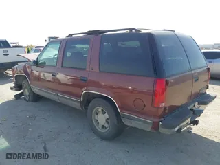 1999 Chevrolet Tahoe with VIN 1GNEC13R9XJ341261, listed as a IAAI auction lot 41741710 with 234,676 mi miles. Bid and sale history available at carsss.com. Image 3.