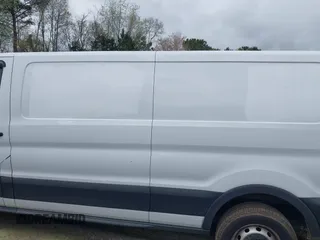 2020 Ford Transit Cargo with VIN 1FTBR1Y85LKA70004, listed as a IAAI auction lot 41910007 with 115,005 mi miles and . Bid and sale history available at DreamBid. Image 14.